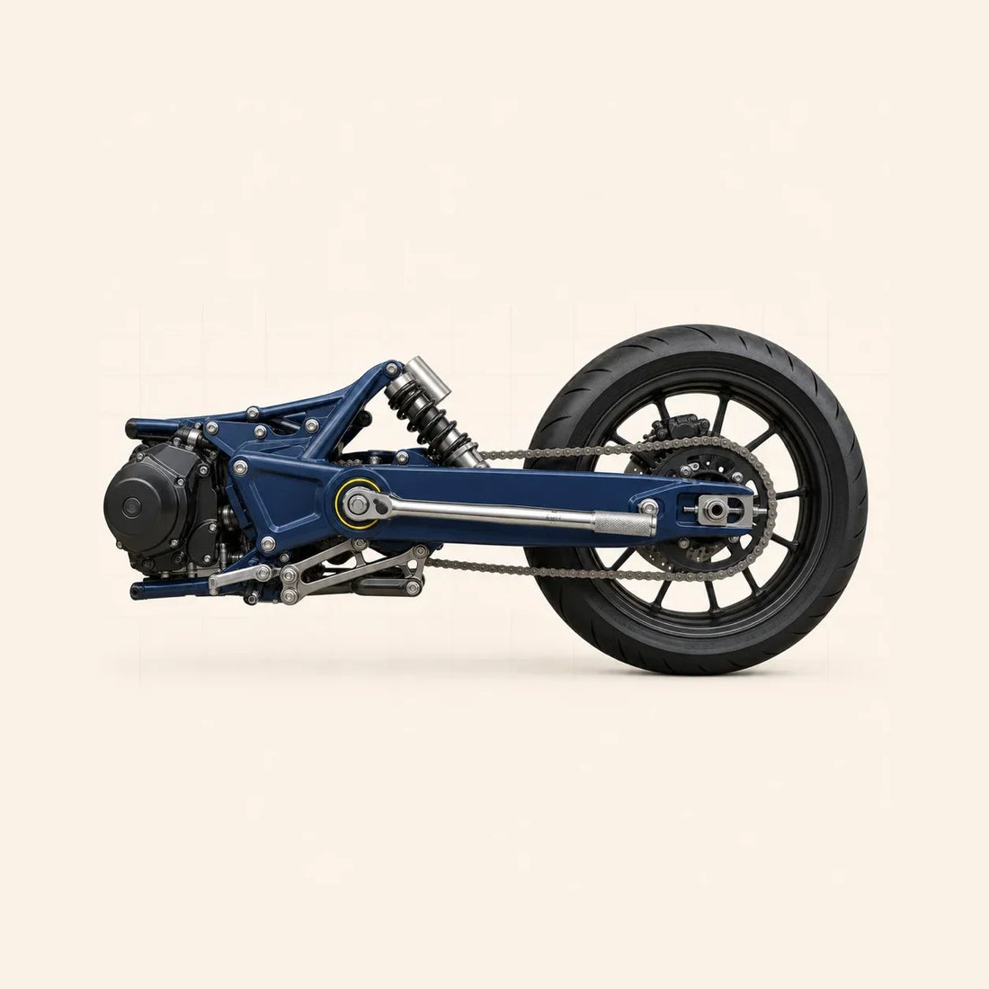 Train arrière de moto bleu acier avec clé dynamométrique sur l’axe de pivot du bras oscillant